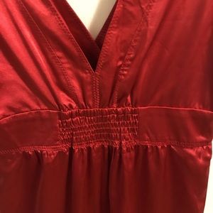 Daniel’s red dress